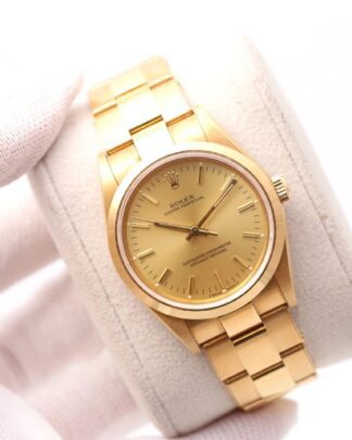 Rolex Oyster Perpetual 34 mm 18ct Gold Champagne Dial 14208